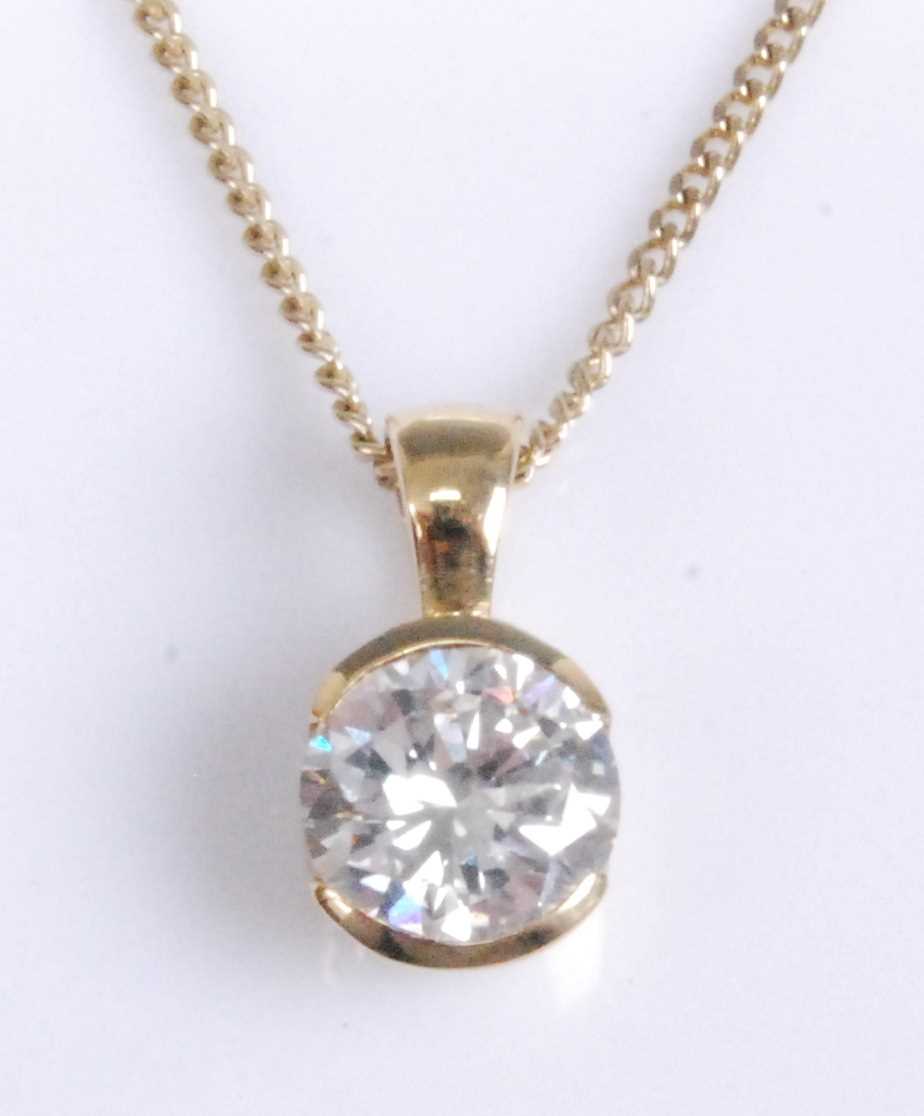 Lot 1216 - An 18ct yellow gold diamond single stone...