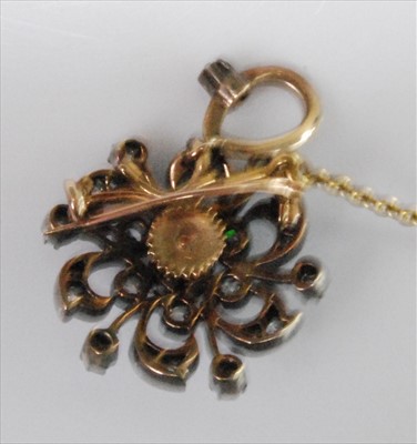 Lot 1234 - A late Victorian circular flower brooch...