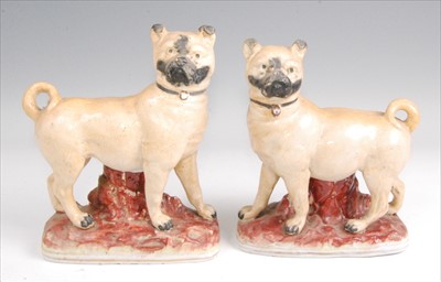 Lot 1126 - A pair of Victorian Staffordshire figures...