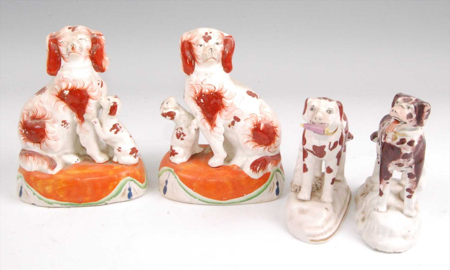 Lot 1130 - A pair of Victorian Staffordshire figures of...