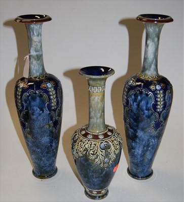 Lot 9 - A pair of Royal Doulton stoneware vases, each...