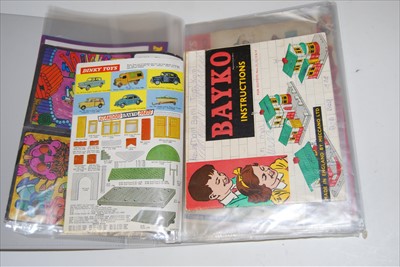 Lot 65 - A folder of assorted toy instruction kits etc,...