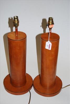 Lot 66 - A pair of large contemporary tan leather clad...