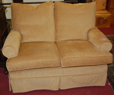 Lot 1115 - A contemporary straw coloured upholstered...