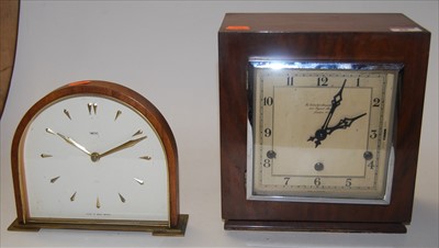Lot 88 - An Art Deco walnut cased mantel clock, having...