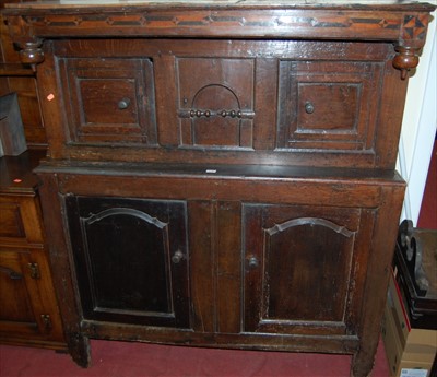 Lot 1133 - An antique joined oak court cupboard, having...