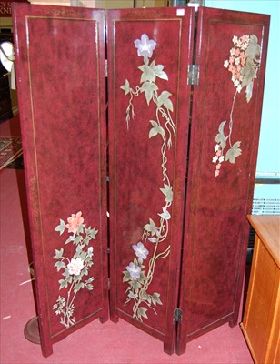 Lot 1141 - A contemporary Japanese red lacquered floral...