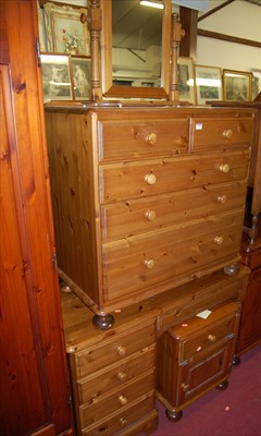 Lot 1170 - A modern pine bedroom suite, comprising round...