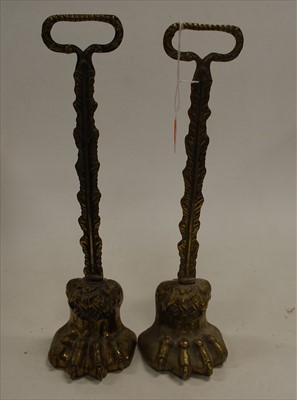 Lot 96 - A pair of Victorian brass doorstops, each in...