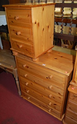 Lot 1176 - A modern pine chest of five long drawers,...