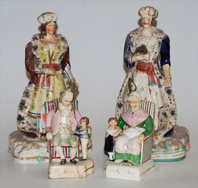 Lot 100 - A pair of 19th century Staffordshire pearlware...