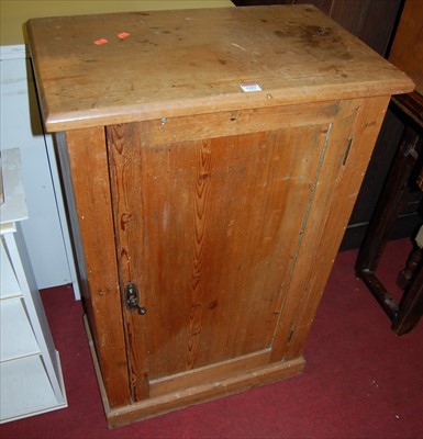 Lot 1203 - A Victorian pine single door side cupboard,...