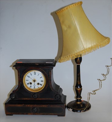 Lot 119 - A late 19th century ebonised mantel clock...