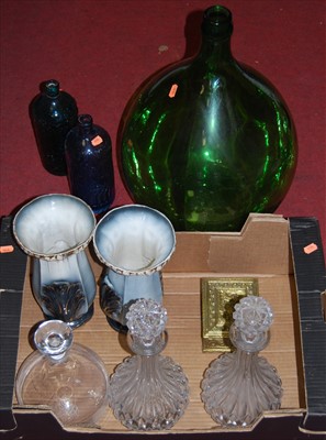 Lot 126 - A large Victorian green tinted glass carboy...