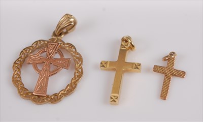 Lot 348 - A 9ct two-colour gold Celtic cross pendant;...