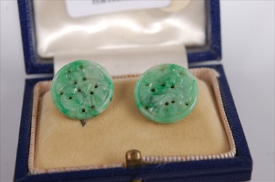 Lot 357 - A pair of carved celadon jade ear clips each...