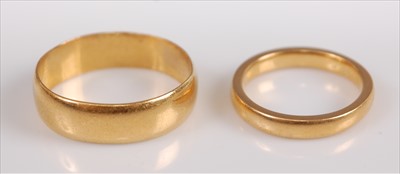 Lot 365 - Two 22ct gold wedding bands, gross weight 9.9g,...