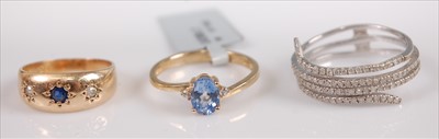 Lot 374 - A 9ct gold gypsy style sapphire and old cut...
