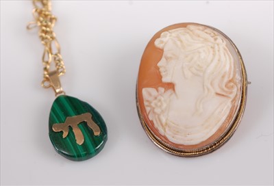 Lot 405 - A malachite pendant on gilt metal neck chain;...