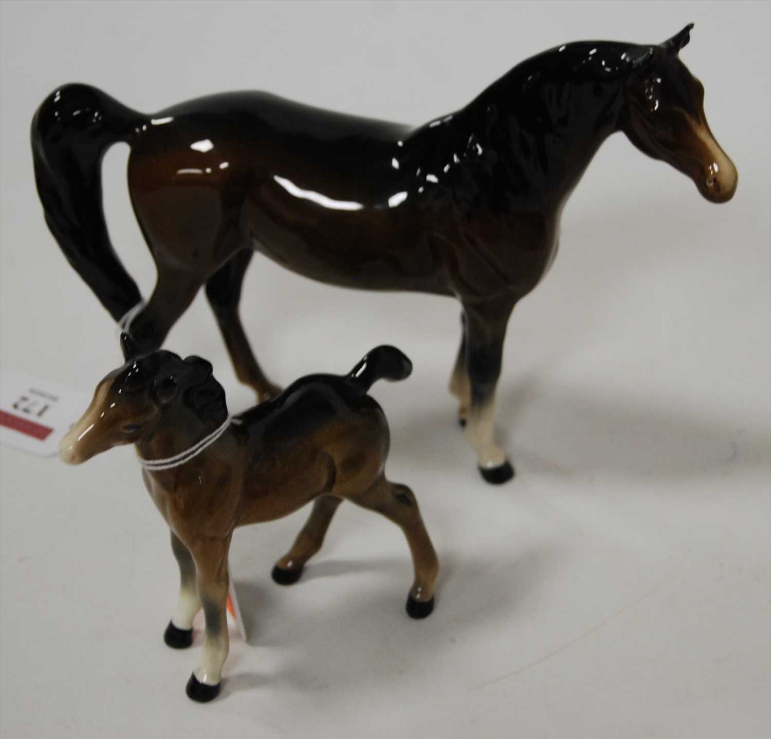 Lot 172 - A Beswick model of a thoroughbred horse with...