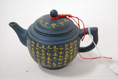 Lot 177 - A small Yixing teapot and cover, having...