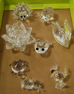 Lot 180 - A collection of Swarovski crystal ornaments,...