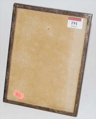 Lot 191 - A George V silver clad easel photograph frame,...