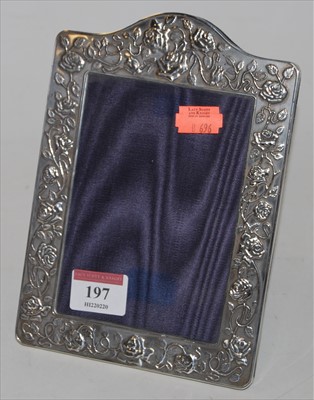 Lot 197 - A modern silver clad easel photograph frame,...