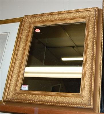 Lot 1018 - A gilt composition framed wall mirror, early...