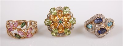 Lot 382 - A contemporary 9ct gold peridot and citrine...
