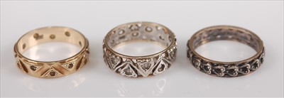 Lot 386 - A 9ct gold and CZ set eternity ring size M,...