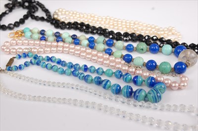 Lot 397 - A turquoise and lapis lazuli beaded necklace...