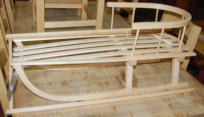 Lot 1215 - A contemporary beech childs snow sledge,...