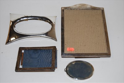 Lot 200 - A George V silver clad easel photograph frame...