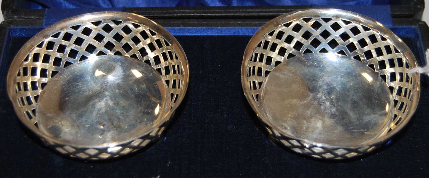 Lot 204 - A pair of George V silver bonbon dishes each...