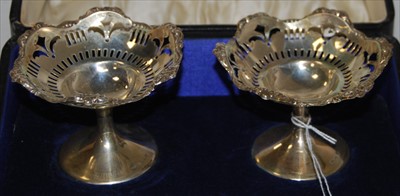 Lot 205 - A pair of George V silver pedestal bonbon...