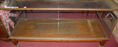 Lot 1228 - A 1930s oak and glazed freestanding shop...