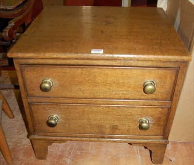 Lot 1230 - A 19th century oak table-top two-drawer chest,...