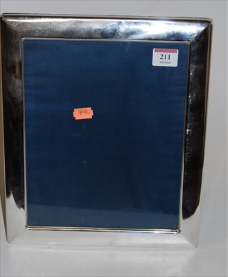 Lot 211 - A large modern silver clad easel photograph...
