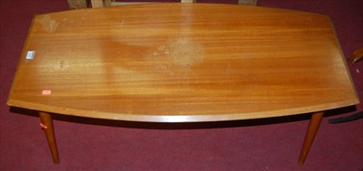 Lot 1244 - A 1970s teak low coffee table, having bowed...