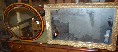 Lot 1055 - A gilt framed rectangular wall mirror together...