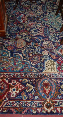 Lot 1121 - A large Persian blue ground Tabriz carpet,...