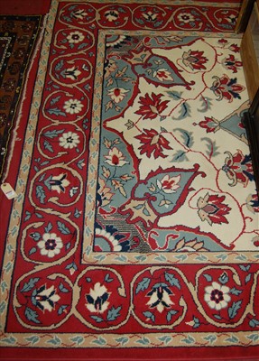 Lot 1122 - A contemporary Persian style machine woven red...