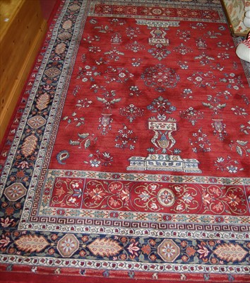 Lot 1123 - A contemporary Persian style machine woven red...