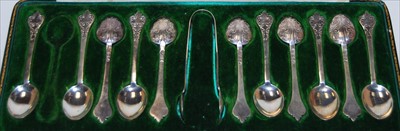 Lot 243 - A cased 12 place setting of silver teaspoons,...