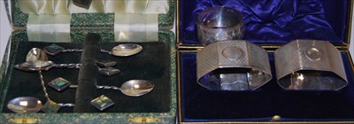 Lot 292 - A pair of George V silver napkin rings, of...
