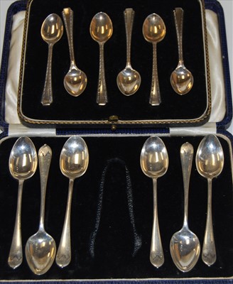 Lot 429 - A cased set of six George V silver teaspoons...