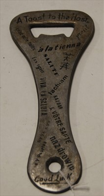 Lot 437 - A novelty oversized bottle opener