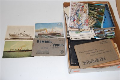 Lot 497 - A quantity of postcards to include real and...