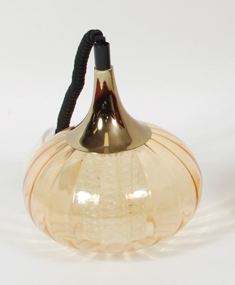 Lot 25 - A 1960s amber glass onion shaped hanging...